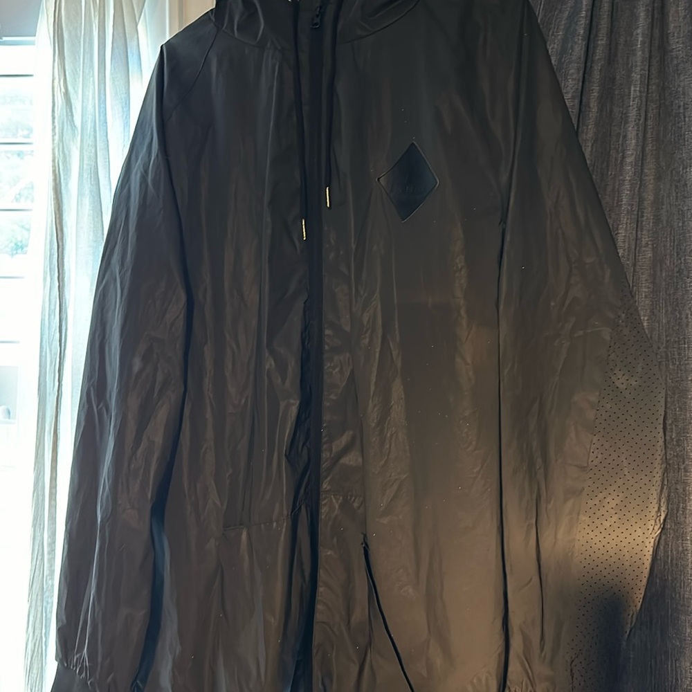 Dutch bro, black hooded raincoat